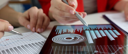 Pricing Consultant studying data to build an effective pricing strategy